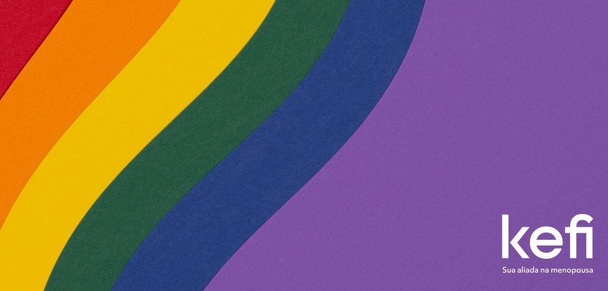 Imagem de capa para o artigo 'Orgulho e Saúde – LGBTQIA+ e Menopausa' no blog da Kefi. Apresenta uma ilustração das cores do arco-íris, simbolizando a comunidade LGBTQIA+, com o logo da Kefi e a frase 'Sua aliada na menopausa' no canto inferior direito.